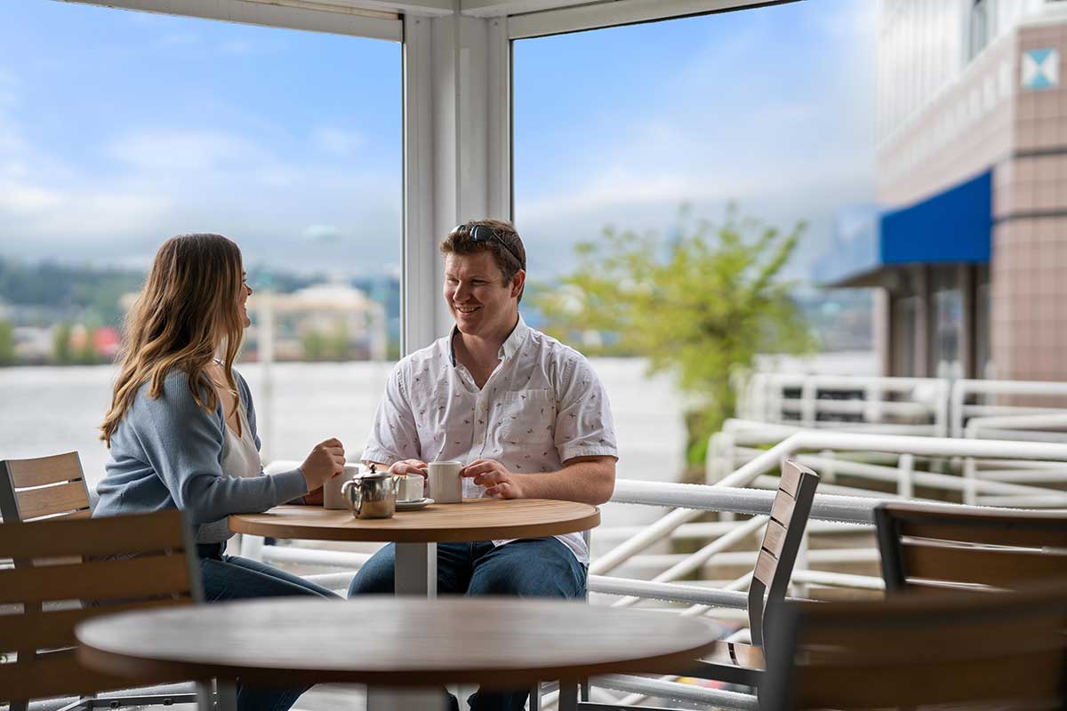 Couple sitting down at a restaurant