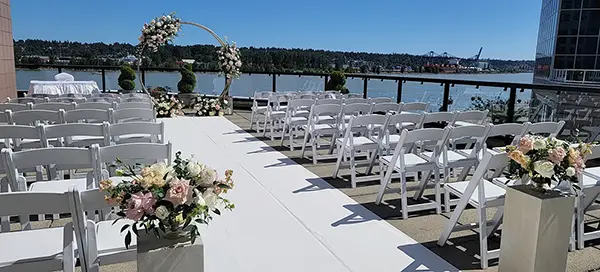 Set up of Outdoor Patio wedding with water views